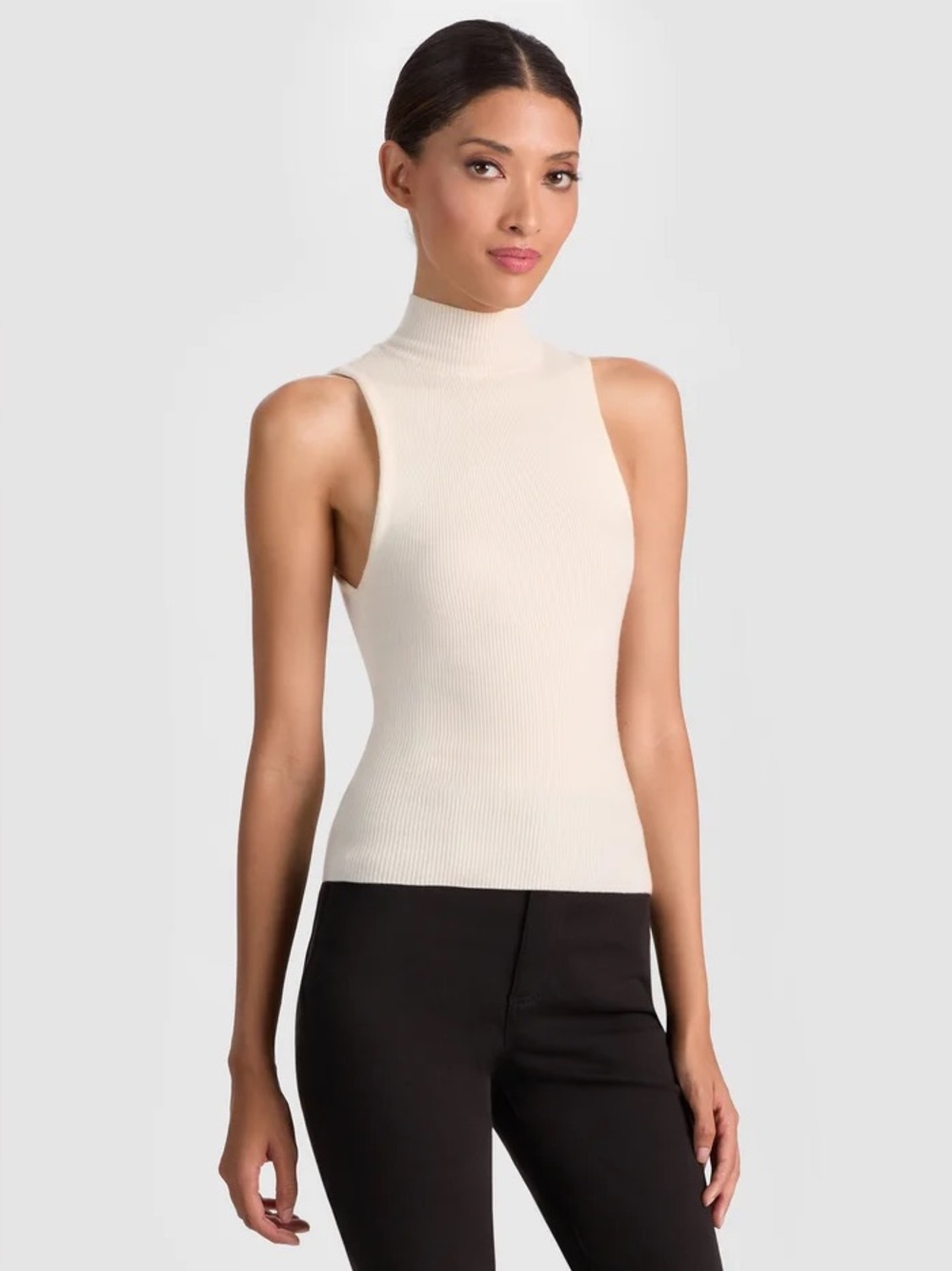 Alice + Olivia Darcy Knit Sleeveless Turtleneck Tank Top in Light Pink